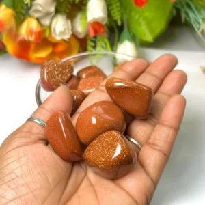 Red Goldstone polished tumble stone with golden sparkle | natural healing crystal store near me